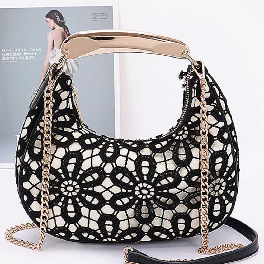 Elegant Black and White Lace Handbag with Gold Accents